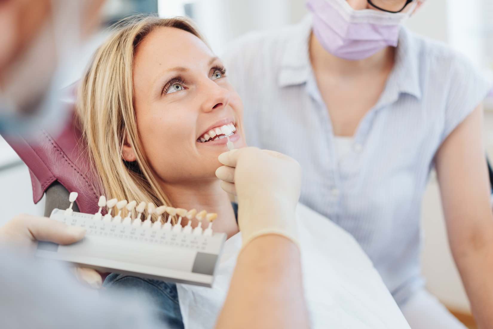 Woman at Smiles at Fleetwood dental group before her cosmetic dentistry procedure.